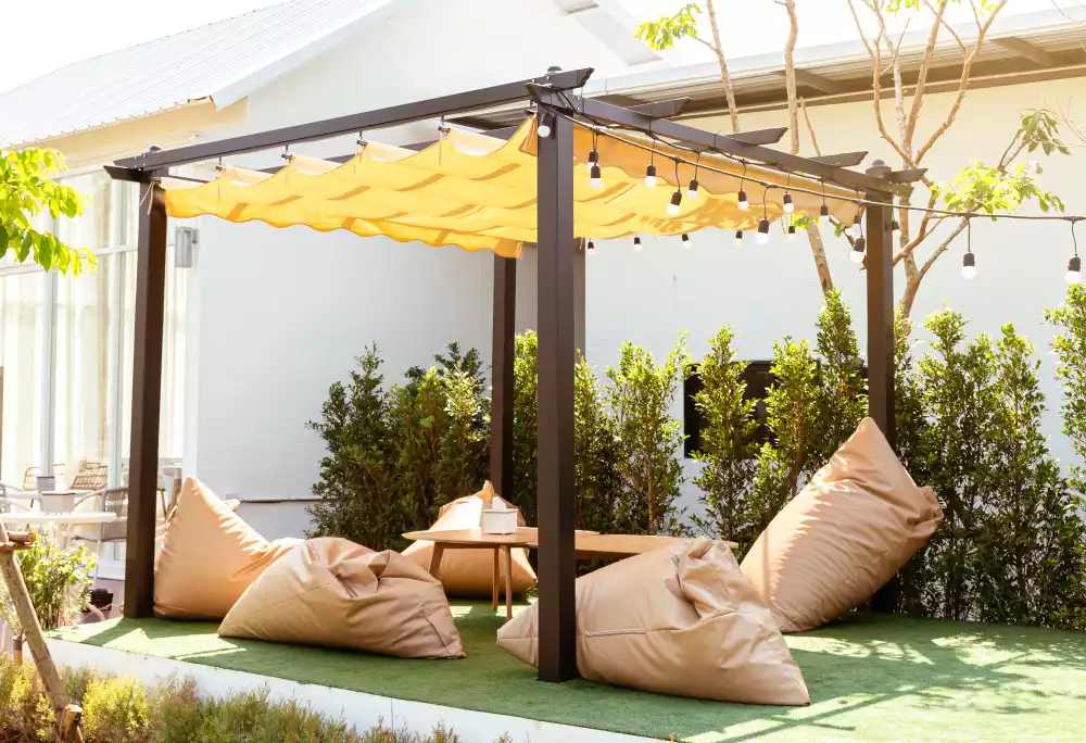 Les méthodes efficaces pour fixer une pergola dans la terre : quelles options choisir ?