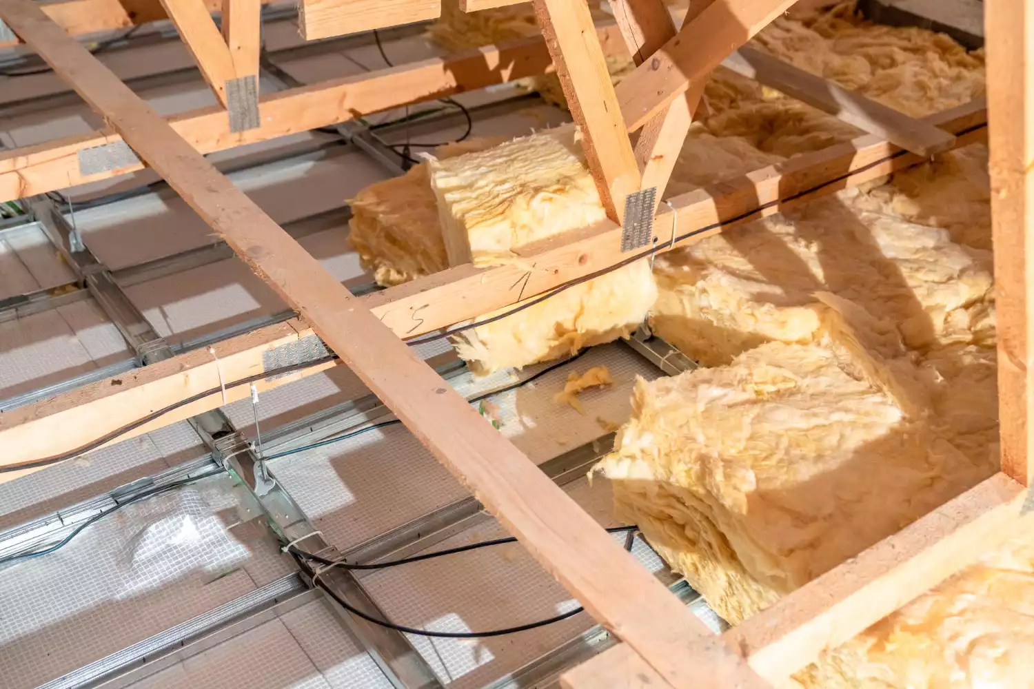 Combien de sacs de laine de verre prévoir pour isoler 100 m² efficacement ?